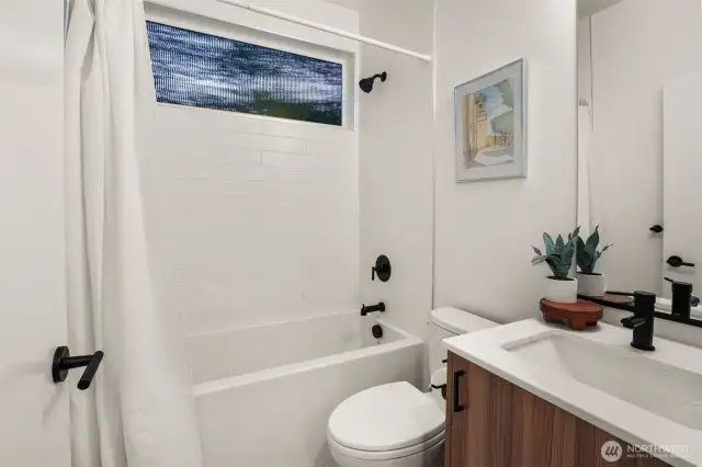 Downstairs full bathroom.