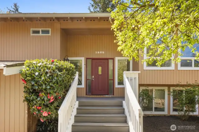 Beautiful front porch, it is the perfect spot to sit and sip your morning coffee!