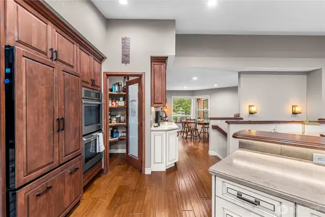 To pantry with double fridge