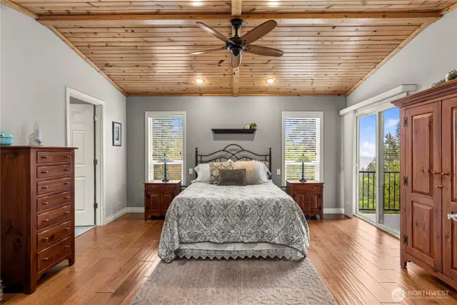 Primary bedroom with slider to deck