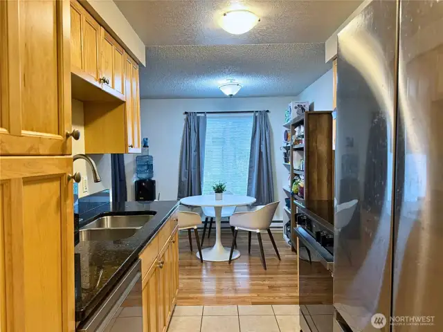 Updated kitchen with new stove and refrigerator