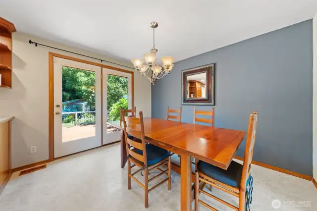 Dining room has access to the BIG deck and back yard.