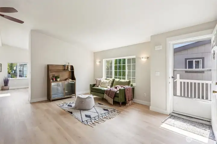 As you step inside, you’ll find a spacious room that can be used as a living room, dining room, or a family room.