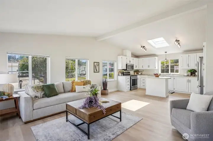 Appreciate the fully renovated interior with fresh paint throughout, new trim, new light fixtures, new and beautiful LVP.