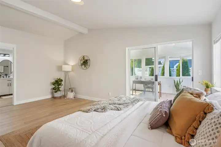 Primary bedroom with access to the bonus room.