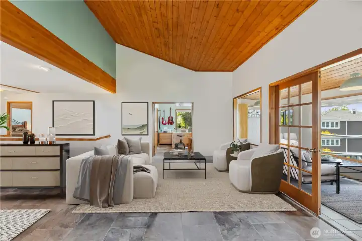 Living room with vaulted ceilings.