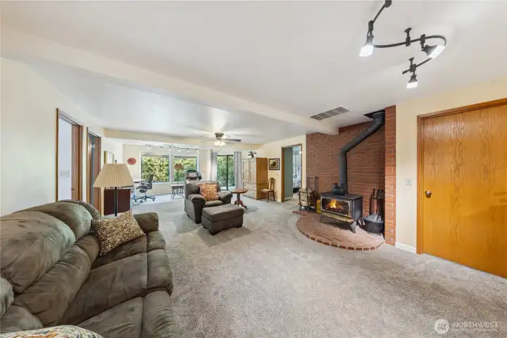 Downstairs family room. Door to the right leads into the mud room/mechanical room.