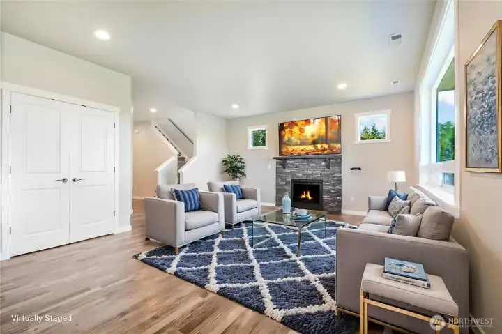 Great room on main level with stunning views, gas fireplace, all mounted tv's stay