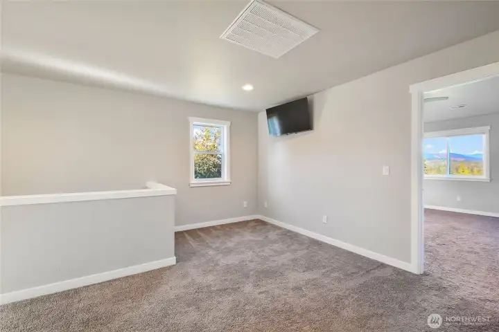 Loft in upper level- could be used as den, play area, exercise space etc