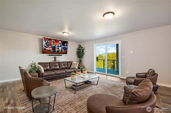 Lower level family room with deck and that stunning view