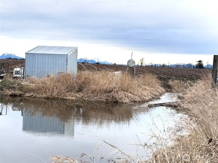 Pond off creek with pump room