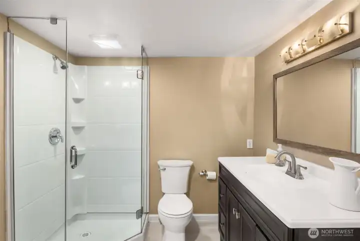 Lower level bath with a shower.