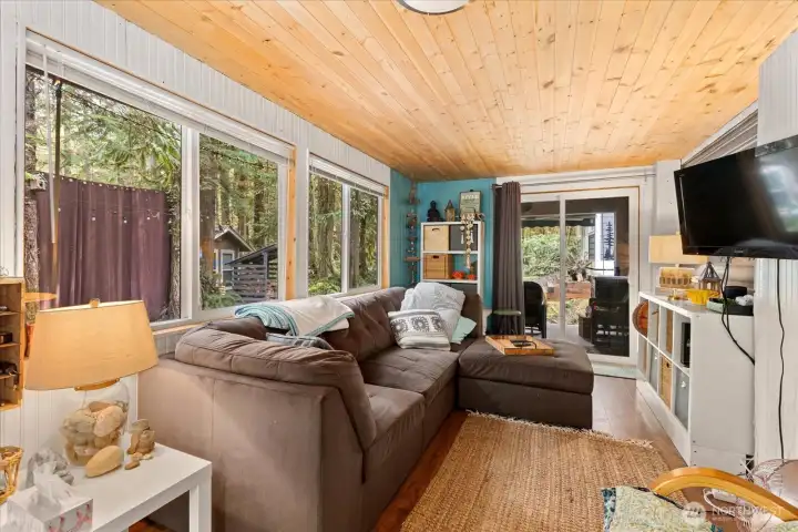 There is a covered back patio just off the back of the living room.