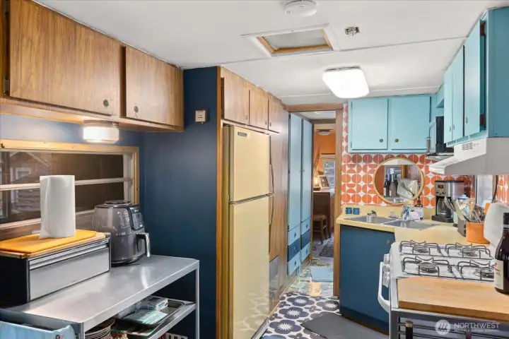 Cook inside or outside (keep flipping through photos there is an outdoor cooking area too!)