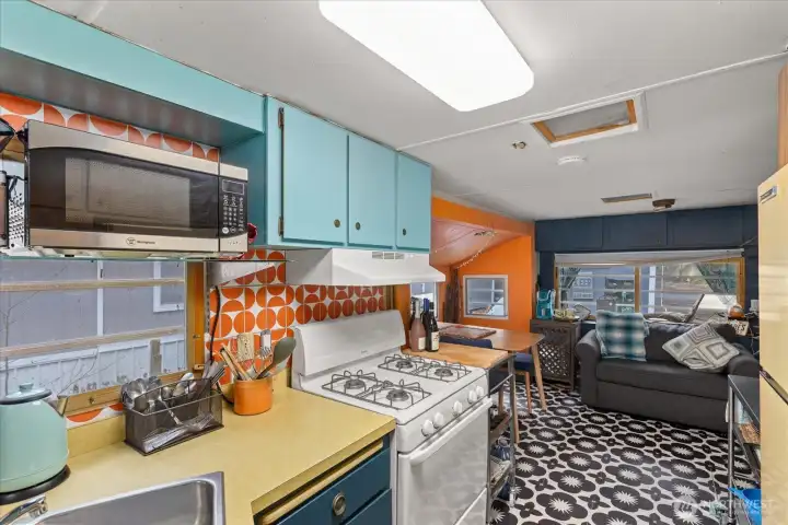 Feels cozy and warm but also has plenty of dining and seating area just off the kitchen.