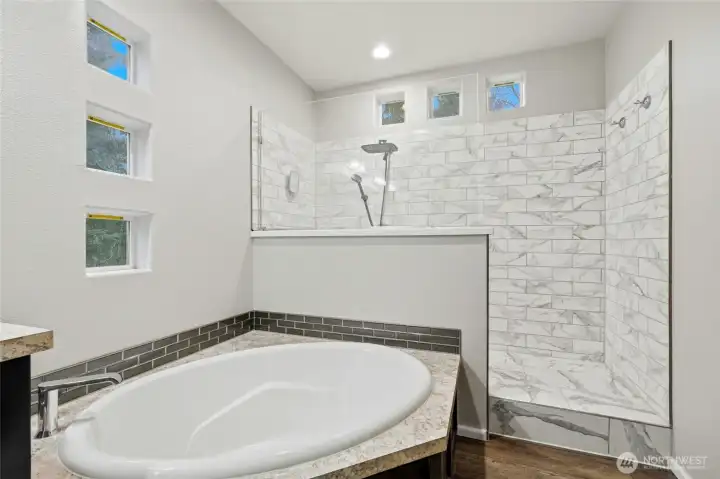 Large soaking tub perfect for unwinding after a long day.