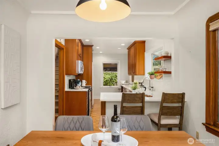 Dining space with seamless flow into kitchen.