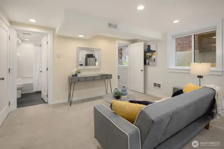 Lower level living space with bonus room, bedroom, bath, and separate entrance that has been used for STR.