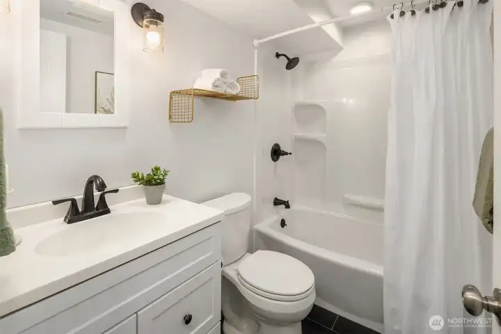 Lower level full bathroom.