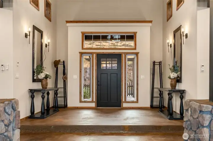 2-story entry and Great Room lives large, yet cozy at the same time