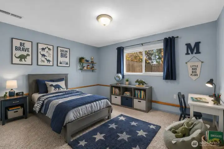 4th bedroom, downstairs. This room is virtually staged