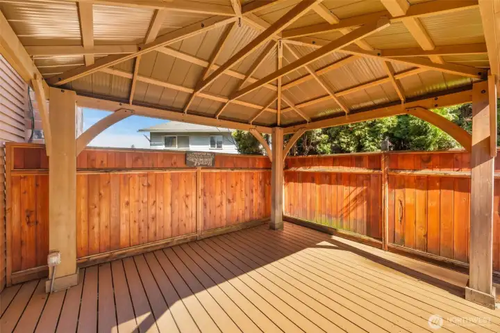 With attached gazebo on side of home