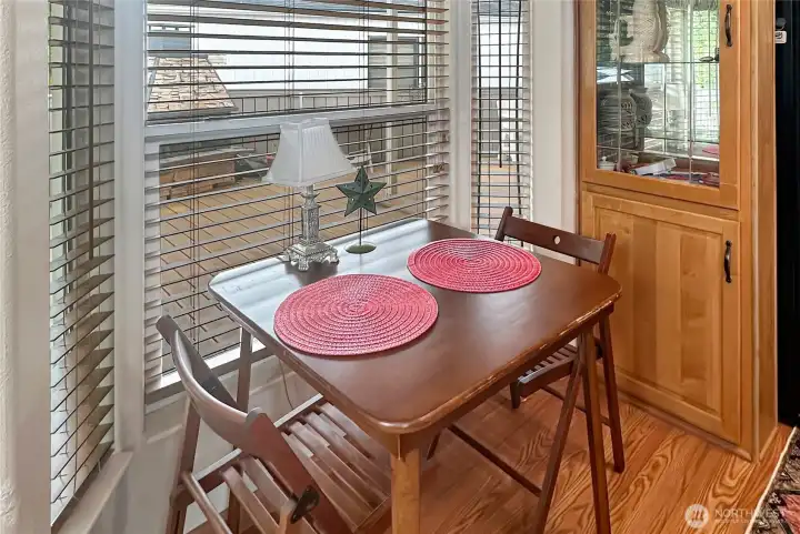 Enjoy your morning coffee while looking out toward the deck.