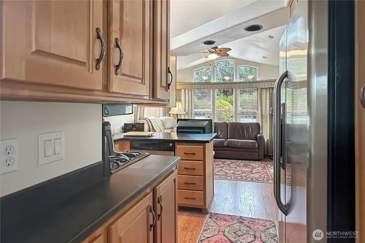 Open-concept layout connects the kitchen to a bright, airy living space, perfect for relaxed coastal living.
