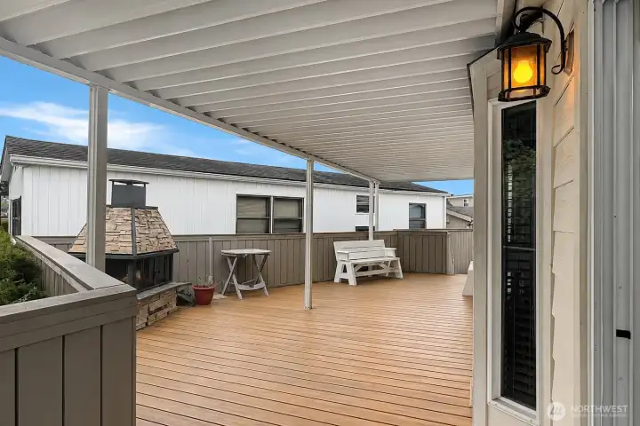 Spacious covered deck, perfect for relaxing or entertaining in any season. Spacious covered deck, perfect for relaxing or entertaining in any season.
