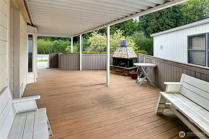 Covered outdoor living area with plenty of room to gather, unwind, and enjoy the fresh coastal air.