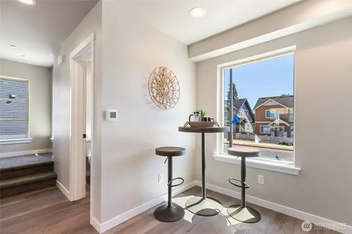 Kitchen with room for a cafe table & window floods the kitchen with natural light
