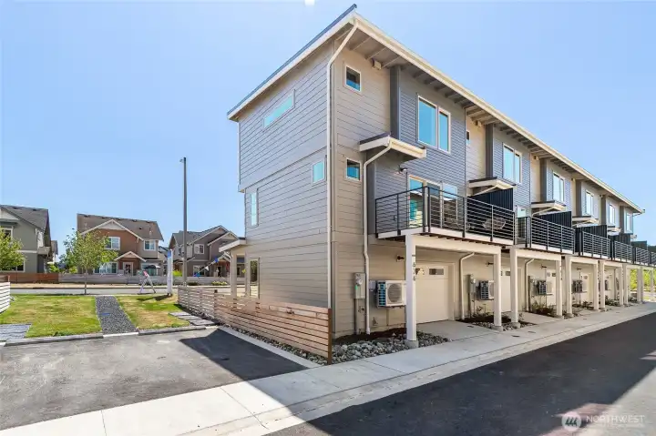 Two parking spaces are conveniently located to the left of this unit for guest parking