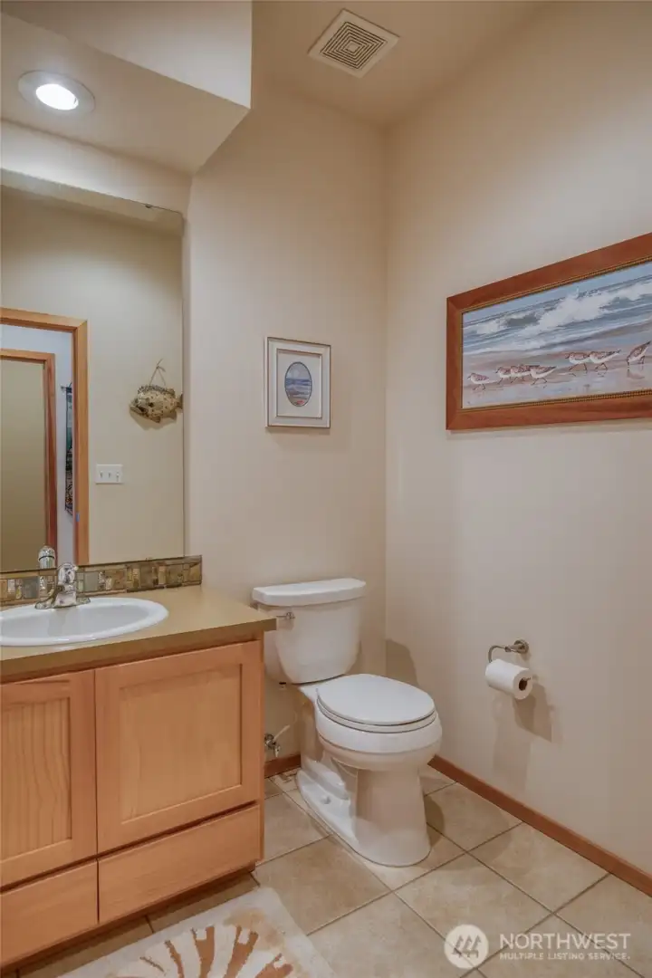 The powder room rounds out the upper level features.