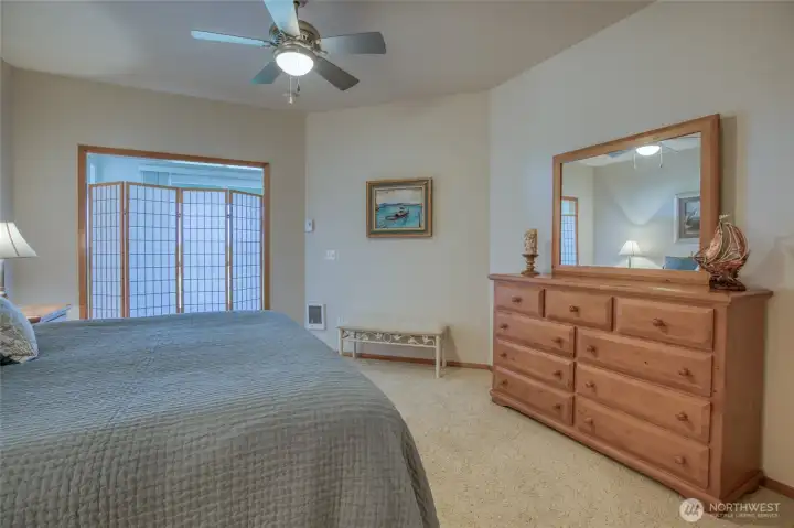 You could easily install french doors, but the privacy screen also works to close off this space.