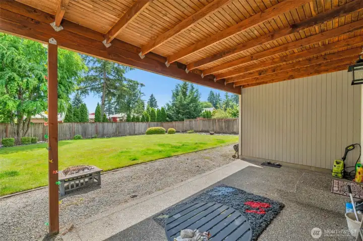 Covered back patio extends your living space outdoors, providing the perfect spot to relax, barbecue, or entertain guests year-round.