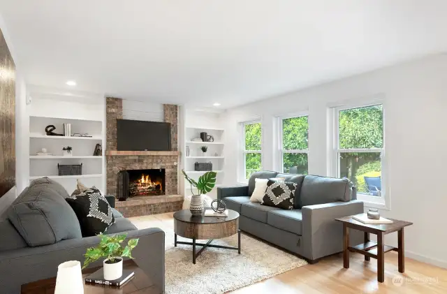 Family Room with gas fireplace, open to kitchen and nook.