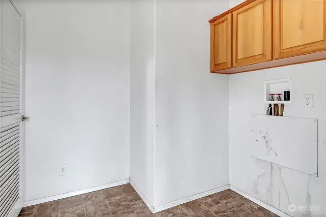 Entry into mudroom, laundry room or whatever you wish it to be.