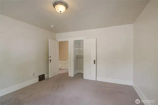 Second bedroom on the second floor features a walk-in closet.