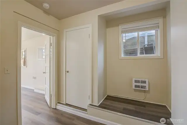 Lower unit bedroom 2, offering a cozy and functional space with easy access to the living room and kitchenette