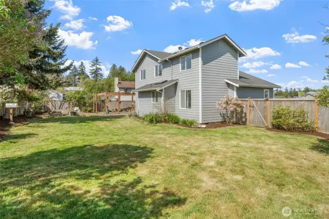 Huge fully fenced backyard.