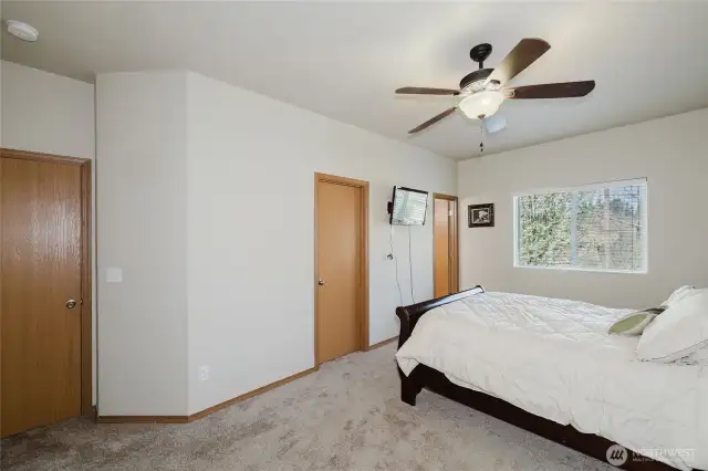 Far right door goes to the primary bath, door on the left goes to the big walk-in closet.