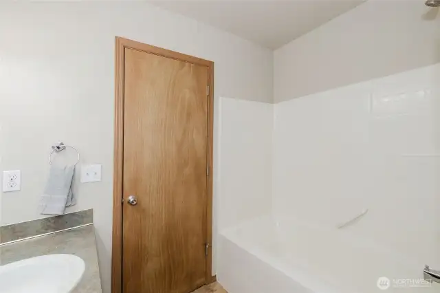 The bathtub in the full top floor bath.