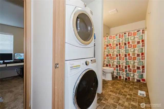 The full bath combination utility room on the lower floor.