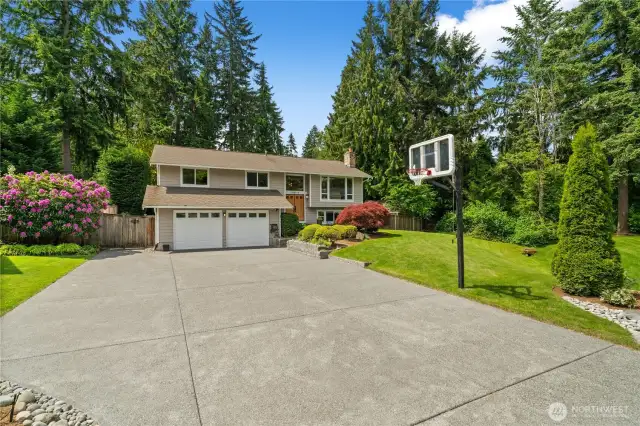 Welcome to this beautifully updated home in Education Hill, ideally situated at the end of a quiet cul-de-sac and backing onto a serene greenbelt. A new expansive driveway provides expansive parking options.