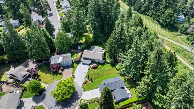 You'll appreciate the warm, welcoming community in this quiet cul-de-sac, where friendly neighbors make it truly feel like home.
