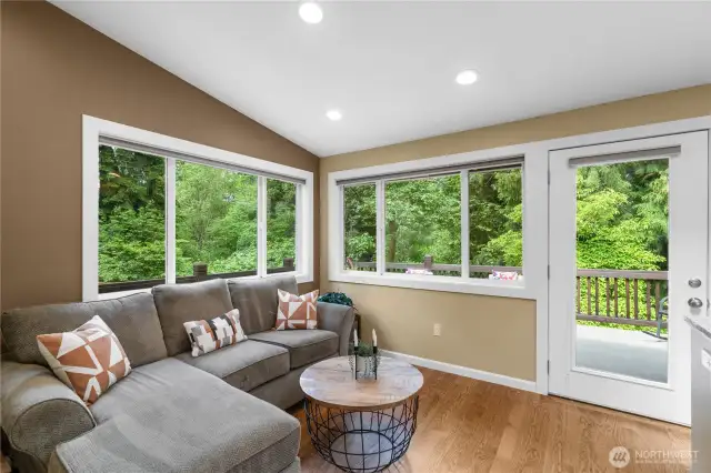 This additional space looks out to a private back yard and offers access to a large deck where you can enjoy the PNW summers.