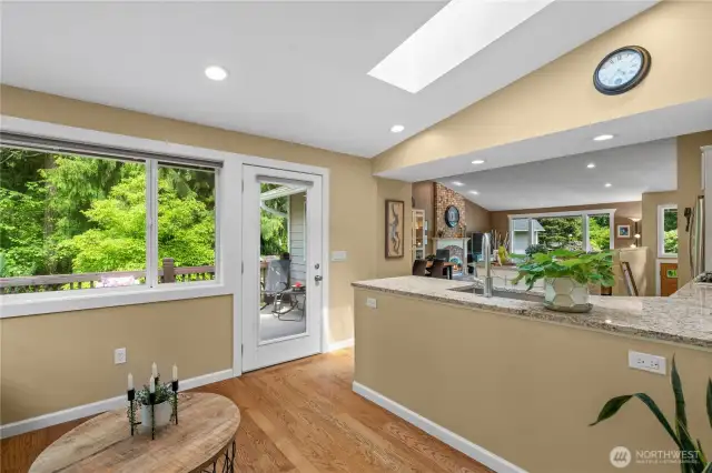 A generous kitchen peninsula encourages easy conversation with guests while you cook, making it a perfect space for both entertaining and everyday living.