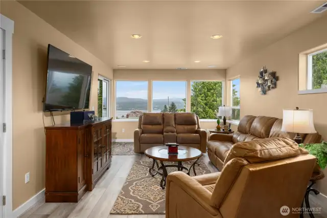 Penthouse level seating area with a deck.
