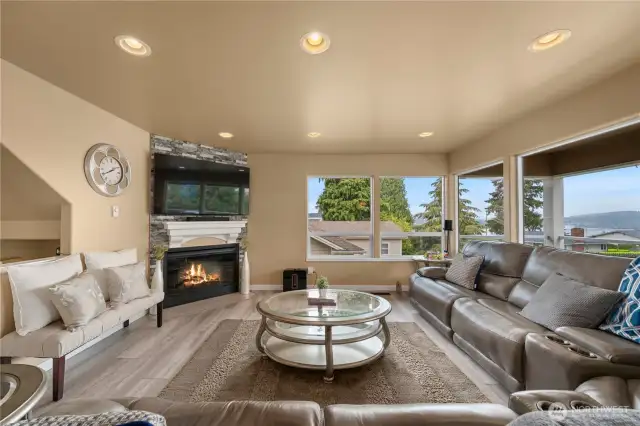 Family room featuring gas fireplace and fantastic lake and territorial views