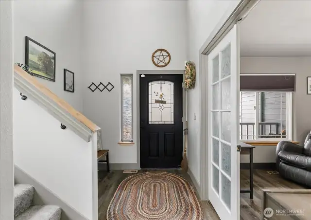 Removal of the closet opened the space creating a more inviting entryway.